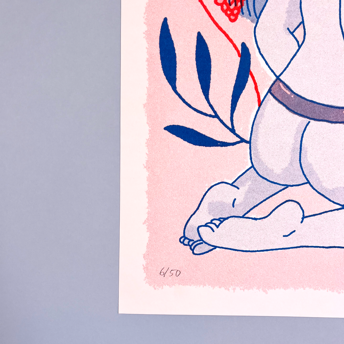 detail of number in print of woman sensual in pastel pink background